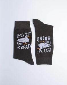 Step up your fun sock game and dive feet first into the world of fun with our Let's Get This Bread Funny Duck Crew Socks. Colored in a sophisticated dark charcoal grey, these men's socks are anything but ordinary. At the center stage is our dapper duck, ready to seize the day and get that bread! And just in case anyone missed the memo, we've got the words "Let's Get This Bread" stylishly scripted, making a bold statement. This charcoal grey colored sock is perfect for the man who loves a blend o Groomsmen Funny Socks, Cheap Fun Socks For Men, Mens Funny Socks, Funny Pattern Socks, Happy Socks Mens, Funny Duck, Funky Socks, Cuss Words, Sock Game