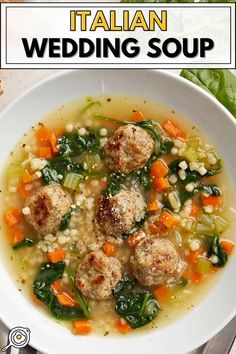 italian wedding soup with meatballs and vegetables in a white bowl on top of a table