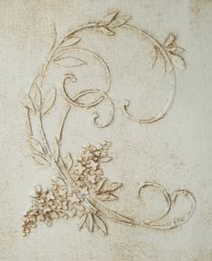 an artistic drawing of flowers and swirls on a wall