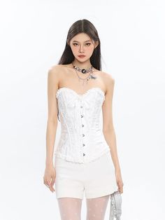 Embrace an air of sophistication with this Corset Top with Feather Detail and Tulle Peplum, a daring fusion of structure and whimsy. Crafted from a high-quality blend, this top features meticulous attention to detail, from the ornate feather accents to the voluminous tulle peplum. The conventional thickness ensures comfort without sacrificing the chic silhouette. Elevate your evening wear or make a statement at an artful social gathering by pairing this top with sleek trousers or a fitted skirt. White Feminine Corset Dress With Boned Bodice, Elegant Lace Corset, Elegant Summer Lace Corset, White Gothic Overbust Corset, Formal Lace Corset, White Boned Bodice Corset For Spring, Elegant Spring Corset Dress For Costume Party, Gothic Corset For Spring, Feminine Wedding Corset With Boned Bodice