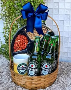 a basket filled with beer and snacks