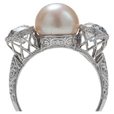 This is a magnificent Edwardian Era (circa 1905) GIA-certified natural (uncultured) saltwater pearl and diamond ring, fabricated by hand in platinum by the oldest jeweler in America, Black, Starr & Frost. This exquisite and sensuous jewel was constructed by a craftsman of consummate Gilded-age skill to showcase what was, at the time, considered to be among the most precious and coveted of all gems: the natural pearl. You see, when this ring was created cultured pearls did not yet quite exist. Pe Luxury Vintage Silver Pearl Ring, Luxury Silver Victorian Pearl Ring, Black Pearl Ring Vintage, Luxury High Luster Silver Pearl Ring, Luxury Antique Diamond Pearl Ring, Diamond Pearl Ring, Diamond Mines, Saltwater Pearls, Pearl And Diamond Ring