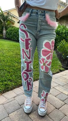 School Spirt Pants, White Senior Jeans Painted, Maroon Senior Overalls, Senior 2023 Jeans, Spirit Week Jeans Ideas, Senior Jeans Painted 2023 Pink, Senior Jeans 2023, Pink Out Jeans Painted, Painted Jeans Seniors