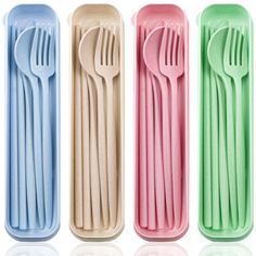 four plastic utensils in different colors and sizes, with spoons and forks sticking out of them