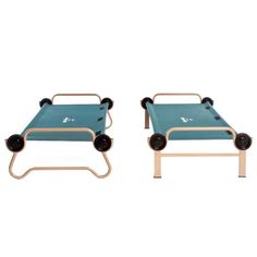 two small beds with wheels on each side and one is attached to the bed frame