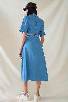 Introducing our Blue Maxi Shirt Dress with Polo Collar, a versatile and stylish piece perfect for spring and summer. This dress features a relaxed fit and maxi length, offering both comfort and elegance for any occasion.  Crafted from lightweight woven fabric, this dress is breathable and airy, making it ideal for warmer weather. The polo collar adds a touch of sophistication, while the button-up closure and short sleeves provide a classic and timeless look.  The dress comes with a belt made from the same fabric, allowing you to cinch the waist for a more defined silhouette or wear it loose for a relaxed vibe. Whether you're heading to a casual outing, a beach vacation, or a weekend brunch, this dress is sure to make a statement.  The model is wearing size S, with measurements of 33-24-36 Tan Scarf, Maxi Shirts, Skirt Jumpsuit, Maxi Shirt Dress, Scarf Headband, Blue Maxi, Romper Pants, Polo Collar, Sweater Coats