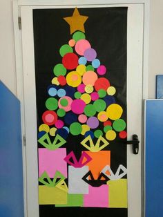 an image of a door decorated with colorful paper and presents on it's side