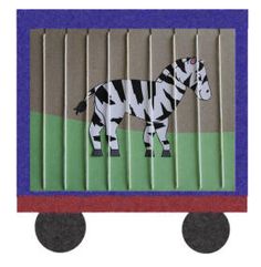 a zebra is painted on the side of a train car with stripes and circles around it