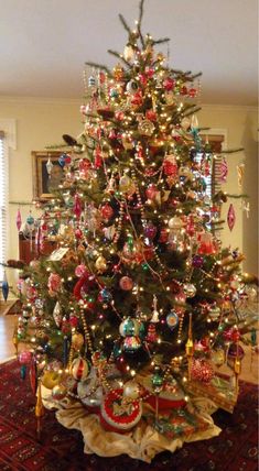 a decorated christmas tree in a living room