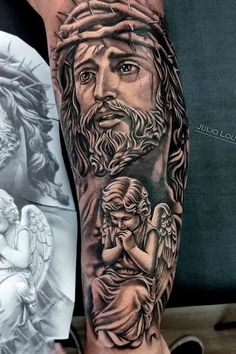 a man's arm with an angel and jesus tattoo on it