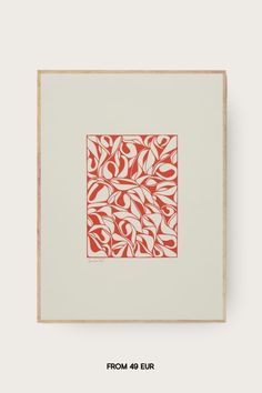 a red and white print with leaves on it