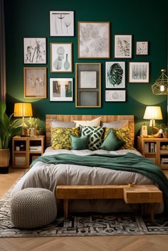 a bedroom with green walls and pictures on the wall above the bed in front of it