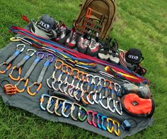 an assortment of tools are laid out on the grass