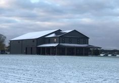 a large building with snow on the ground