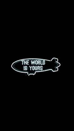 the world is yours neon sign on a black background with an oval shape that reads,'the world is yours '