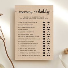 a baby shower game with the words mommy or daddy on it