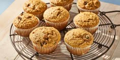 twelve muffins on a wire cooling rack ready to be eaten