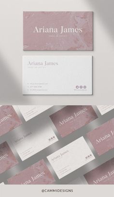 two business cards with pink marble textured paper on the front and back, one in white