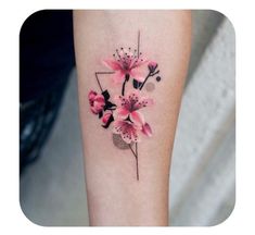 an instagram photo with pink flowers on the left side of the arm and in the middle