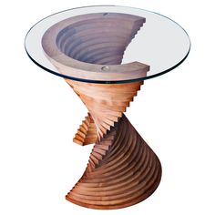 an unusual wooden table with glass top and spiral design on the base is made out of wood