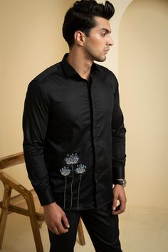 Men'S Black Color Atore Full Sleeves Shirt This Black Shirt Is Made Of Soft And Smooth Cotton Satin. The Right Bottom Corner Features Intricate Blue Flower Embroidery, Adding A Pop Of Color And Texture To The Shirt. The Embroidery Is Delicate And Detailed, Making The Shirt A Unique And Stylish Addition To Any Wardrobe. Color :Black Fabric/Material :Cotton Satin Sleeve Description :Full Product Category :Shirts Wash Care :Dryclean Only Blue Flower Embroidery, Shirts Embroidery, Embroidery Suit, Wardrobe Color, Mens Kurta, Aari Embroidery, Hand Embroidery Kit