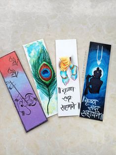 three bookmarks with different designs on them