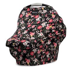 a black and pink flower covered car seat cover with flowers on the front, sitting against a white background