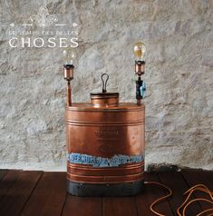 an old fashioned keg with two light bulbs on it's side and the words choose