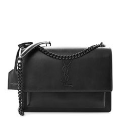 This is an authentic SAINT LAURENT Calfskin Medium Monogram Monochrome Sunset in Black. The bag features a black chain link strap with a leather shoulder pad, a front facing flap with a signature YSL logo, gusseted sides, and exterior pocket. This bag opens with a magnetic snap to a black partitioned suede leather interior with a patch pocket. Pop Stitch, Ysl Logo, Baguette Bag, Dark Beige, Black Chain, Saint Laurent Bag, Wallet Chain, Black Cross Body Bag, Leather Interior