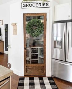 32 Pantry Doors with Glass That Show Off Your Essentials Light Paint Colors, Farmhouse Pantry, Laminate Furniture, Farmhouse Decoration, Pantry Door, Diy Farmhouse Decor, Weathered Wood, Walk In Pantry, Faux Wood