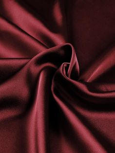 Indulge in the luxurious feel of this 58"/60" wide (147/152 cm) Silk Skin Duchess fabric, also known as Peau de Soie. Its dull satin finish and lightweight drape make it a perfect choice for creating elegant bridesmaid dresses, formal gowns, or any special occasion attire. With a subtle sheen and smooth texture, this high-quality silk fabric offers a sophisticated look and feel. Whether you're a professional dressmaker or an avid sewing enthusiast, this versatile material will elevate your projects with its timeless beauty and exceptional craftsmanship. Elevate your sewing experience and create stunning garments that will turn heads with this premium Silk Skin Duchess fabric. Luxurious Fabric: Crafted from exquisite peau de soie silk, this fabric offers a dull satin finish and a smooth, su Matte Satin Dress, Luxury Solid Satin Tie, Silk Texture Fabric, Duchess Fabric, Bordeaux Dress, Red Satin Fabric, Burgundy Formal Dress, Silk Texture, Bordeaux Color