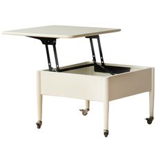 a white coffee table with wheels and an open drawer on the bottom, in front of a white background