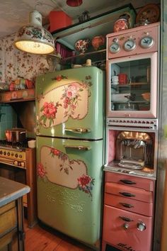 an old fashioned refrigerator and stove in a kitchen