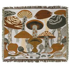 a tapestry with mushrooms and other plants on it