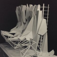 an architectural model is shown with scaffolding on the top and bottom part in black and white