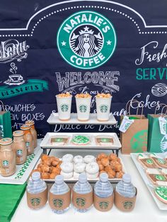 there are many drinks and snacks on the table at this starbucks coffee themed birthday party