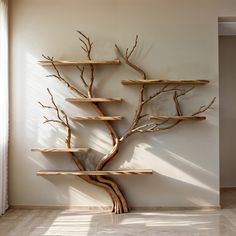 a tree shaped shelf in the corner of a room