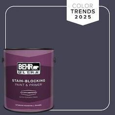 a purple paint can with the words behr ultra next to it in white lettering