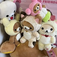 a group of stuffed animals sitting next to each other