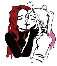 two women with red hair are hugging each other