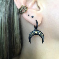 Two toned Moon phase hoops are made of 316L Stainless steel . Moon is detachable, can wear as simple hoop. Size of earrings 1 1/4 inches (from edge to edge) Moon width: 7/8 inches Hoop inner diameter: 10mm Post :0.8mm / 21G (regular post) Ships in a gift box Celestial Crescent Cartilage Earrings, Black Crescent Celestial Jewelry, Celestial Black Crescent Jewelry, Black Half Moon Jewelry With Moon Phase Detail, Black Half Moon Jewelry With Moon Phase Design, Handmade Black Crescent Earrings, Black Celestial Moon Phase Jewelry, Celestial Black Moon Phase Jewelry, Black Crescent Earrings For Pierced Ears