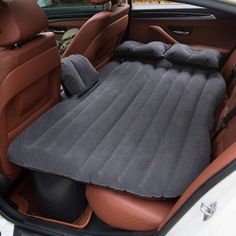 an inflatable car seat is shown with the back seats down