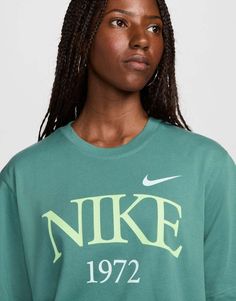 Top by Nike The foundation of your outfit Crew neck Short sleeves Nike print to chest Oversized fit Nike Cree Neck, Green Nike Crew, Leopard Nike Shirt, Women's Nike Shirts, Nikey Mucle Shirts, Nike Top Womens, Nike Shirts Womens, Brown Nike Tee, Nike Tshirts Women