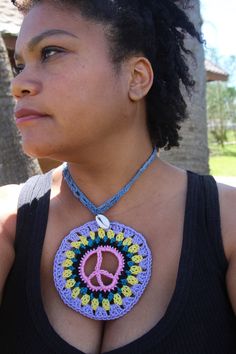 Handmade crochet necklace/Choker in Denim and with Peace sign granny (circle) motif and Shell detail. Silver Chain and clasp for back closure. Spring Summer Boho style. Casual/Beach/Statement/Festival/Jewellery 100% Cotton. In Denim. One Size Peacekeeper Mandala Pattern by Starlily Creations (Etsy) Handmade with Love by Kinyonga (Spain). Adjustable Crochet Necklaces For The Beach, Adjustable Crochet Necklace For Beach, Handmade Retro Necklaces For Festival, Retro Handmade Necklaces For Festival, Handmade Retro Necklace For Festivals, Handmade Retro Necklace For Festival, Retro Handmade Necklace For Festival, Summer Festival Retro Jewelry, Retro Summer Festival Jewelry