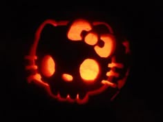 a hello kitty pumpkin carved into the shape of a cat