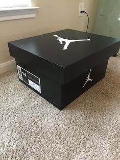 an air jordan coffee table on the floor