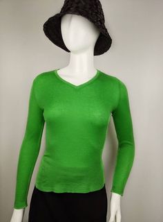 "Vintage bright green color sweater cardigan from ISSEY MIYAKE. V-neck line raglan knit Size tag XL (see the measurements) Condition 8/10 (there are three small holes, a barely noticeable spot on the front) Made in Japan Fabrics : 100% Underarm to underarm - 44cm/17.3\" Length from the back - 52cm/20.4\" Sleeve length from throat -66cm/26\" All measurements taken with garment lying flat. Vintage sizes vary greatly! We recommend comparing measurements with a similar style garment you own for best Animal Print Crop Tops, Raglan Knit, Green Long Sleeve Shirt, Color Sweater, Long Sleeve Jumper, Green Long Sleeve, Pullover Sweater Women, Print Crop Tops, Issey Miyake