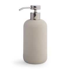 a white soap dispenser on a white background