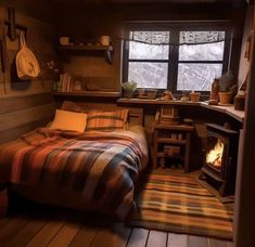 a bed in a room with a fire place