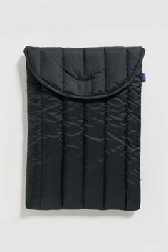 an image of a black padded pouch on a white background